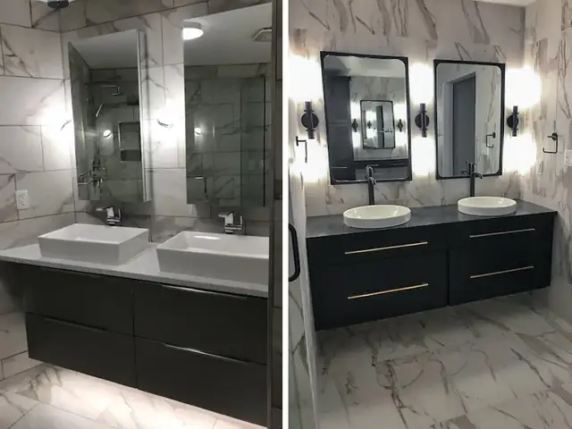 Elkhart bathroom remodel with a floating black double vanity, white vessel sinks, black framed mirrors and marble-look tile